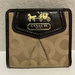 Coach Bifold Mini Wallet In Signature Canvas with 3 card slots and a ID window.